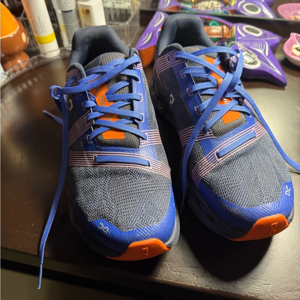 On Running Athletic Shoes in Blue and Orange